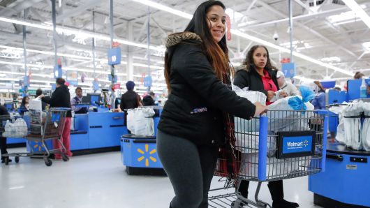 Shoppers leave a Walmart store in Chicago, November 20, 2018.