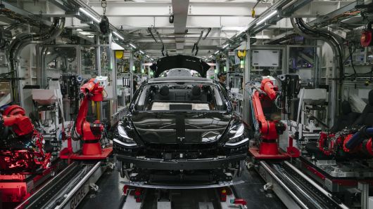 A Tesla Model 3 is seen in the general assembly line at the Tesla factory in Fremont, California, on Thursday, July 26, 2018.