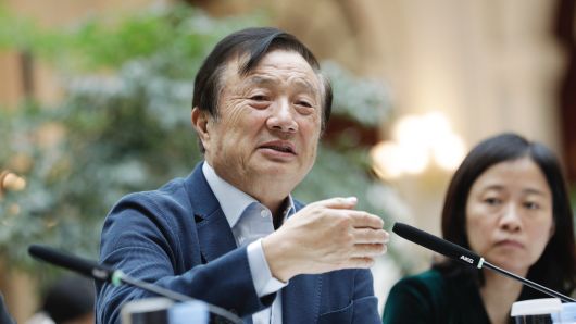 Ren Zhengfei, founder and chief executive officer of Huawei Technologies Co., left, speaks during an interview at the company's headquarters in Shenzhen, China, on Tuesday, Jan. 15, 2019.