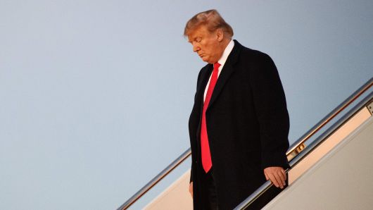President Donald Trump steps off Air Force One upon arrival at Andrews Air Force Base in Maryland on January 14, 2019.