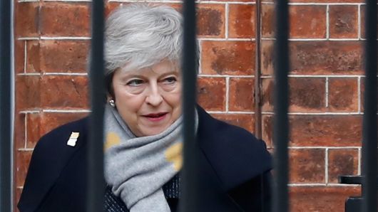 Britain's Prime Minister Theresa May leaves 10 Downing Street in London on February 5, 2019. - A top EU official warned Monday that the prospect of Britain crashing out of the bloc next month looks more likely than ever, as Prime Minister Theresa May sought to reassure foreign investors worried about a chaotic Brexit.