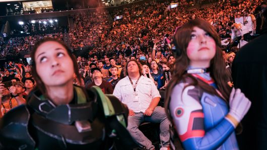 Spectators and fans react during the Activision Blizzard Overwatch League Grand Finals in New York on July 27, 2018.