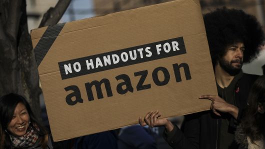 Activists and community members who opposed Amazon's plan to move into Queens rally in celebration of Amazon's decision to pull out of the deal, in the Long Island City neighborhood, February 14, 2019 in the Queens borough of New York City.