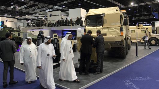 Attendees walk the floor at IDEX, the International Defence Exhibition and Conference, in Abu Dhabi in 2015.
