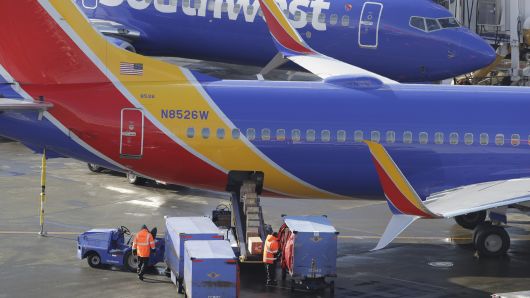 Southwest Airlines planes are loaded Tuesday, Feb. 5, 2019, at Seattle-Tacoma International Airport in Seattle.