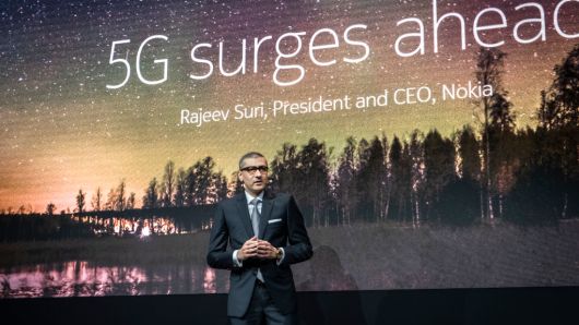 Rajeev Suri, president and CEO of Nokia, is seen speaking during a presentation of new products.