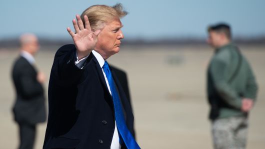 US President Donald Trump boards Air Force One prior to departure from Joint Base Andrews in Maryland, February 25, 2019, as he travels to Hanoi, Vietnam for a second summit with North Korean leader Kim Jong Un.