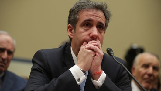 Michael Cohen, former attorney and fixer for President Donald Trump, gets emotional listening to Rep. Elijah Cummings (D-MD) give his closing statement after Cohen testified before the House Oversight Committee on Capitol Hill February 27, 2019 in Washington, DC.