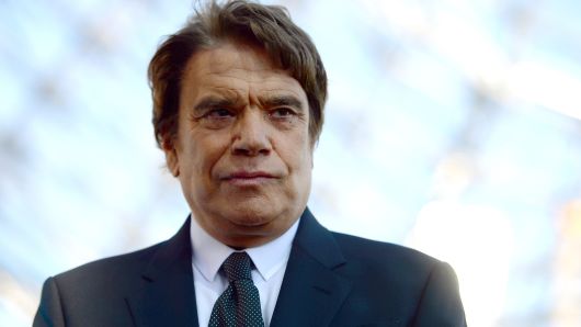 A photo taken on May 26, 2013 shows former president of the Olympique de Marseille Bernard Tapie attending the festivities marking the anniversary of Olympique de Marseille football club's 1993 UEFA Champions League title at the Velodrome stadium in Marseille, southeastern France.