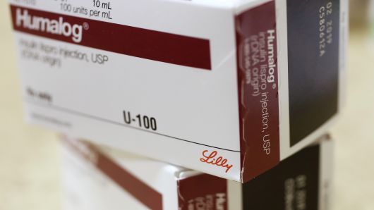 Boxes of Eli Lilly & Co. Humalog medication sit on a pharmacy shelf in Provo, Utah.