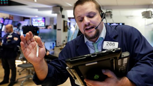 Traders work on the floor of the New York Stock Exchange, October 30, 2018.