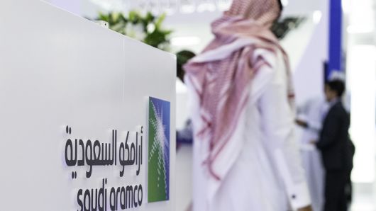 A Saudi Aramco logo sits on display during the Abu Dhabi International Petroleum Exhibition & Conference in Abu Dhabi, United Arab Emirates, on Nov. 13, 2018.