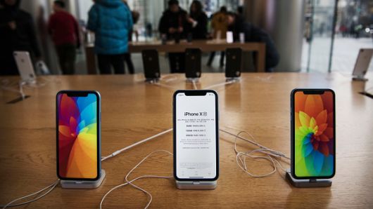 Apple iPhones are seen on display at an Apple Store on January 7, 2019 in Beijing, China.