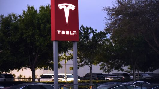 The Tesla dealership in Eatonville, Florida is seen on March 1, 2019, the day after Tesla announced that it was closing its retail stores as a cost-cutting measure, in a shift to on-line only sales.
