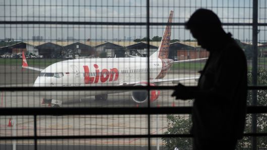 A Batik Air Boeing Co. 737 Max 8 aircraft, operated by Lion Air, center, sits on the tarmac at Soekarno-Hatta International Airport in Cenkareng, Indonesia, on Tuesday, March 12, 2019.