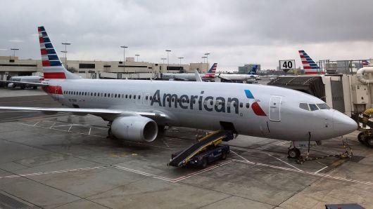 An American Airlines Boeing 737 800 sits at a gate at Los Angeles International Airport on May 24, 2018.