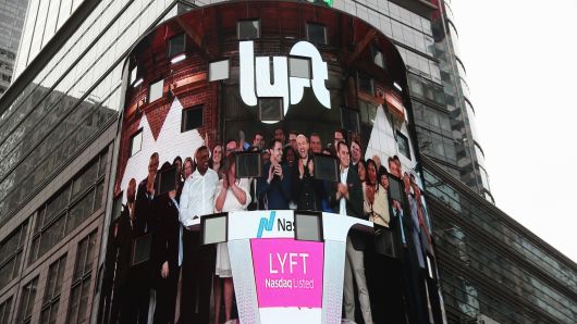 Signage for Lyft is seen displayed at the NASDAQ MarketSite in Times Square in celebration of its initial public offering (IPO) on the NASDAQ Stock Market in New York, U.S., March 29, 2019.